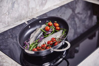 Poêle à poisson revêtue